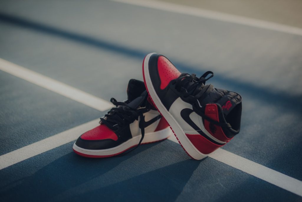 pair-of-black-white-and-red-air-jordan-1-shoes-adz5yiuedqg